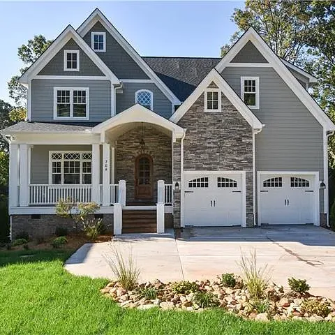 Contemporary craftsman home with stone accents